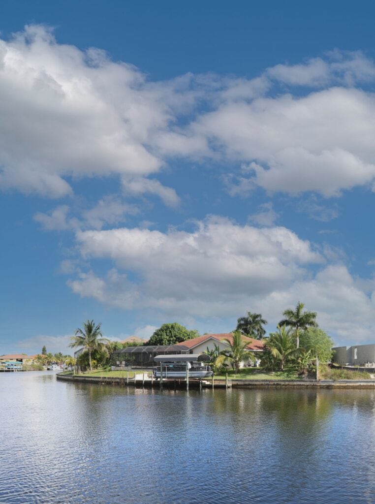 Palm-shaded waterfront home on a Northeast Florida canal