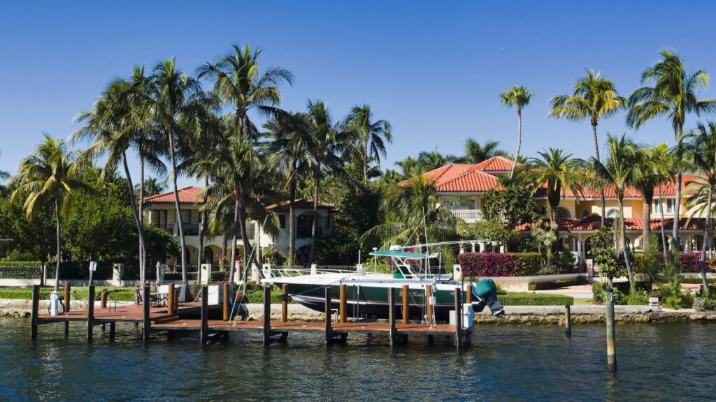 Boat raised on a private dock lift at a waterfront home