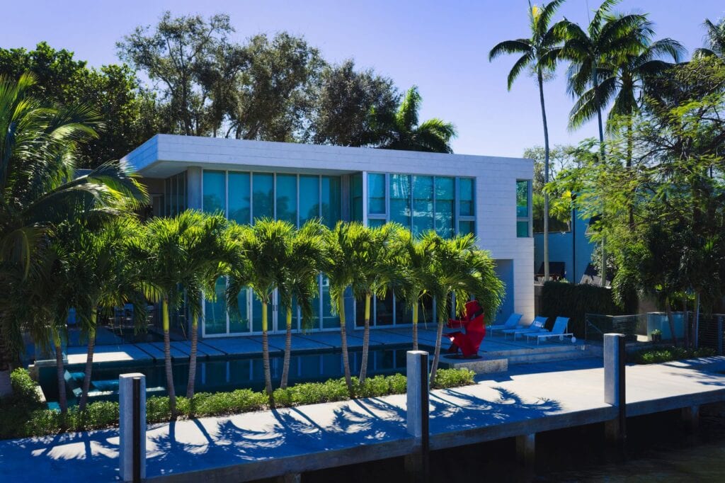 Contemporary waterfront residence above a piled dock