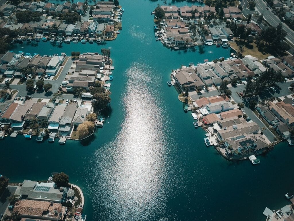 Aerial view of a waterfront community and its navigable canals